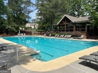 community pool featuring a patio