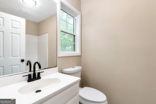 235 Baugh St, Commerce, GA 30529 - full bath with toilet, vanity, and a shower