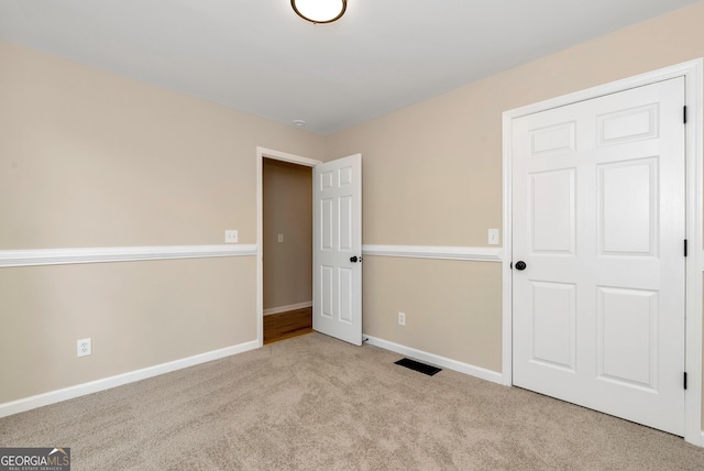 235 Baugh St, Commerce, GA 30529 - unfurnished bedroom with carpet and baseboards