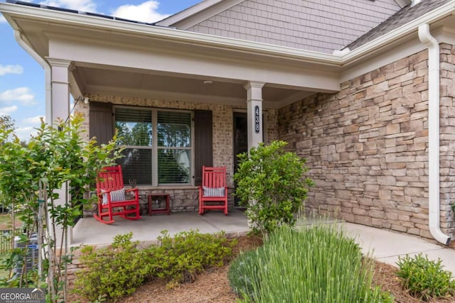 438 Southland Cir, Canton, GA 30115 - property entrance with a porch and stone siding