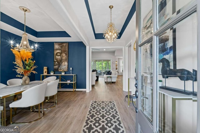 438 Southland Cir, Canton, GA 30115 - foyer entrance with a chandelier, wood finished floors, baseboards, and a raised ceiling