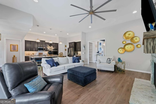 438 Southland Cir, Canton, GA 30115 - living room featuring ceiling fan, recessed lighting, wood finished floors, and baseboards