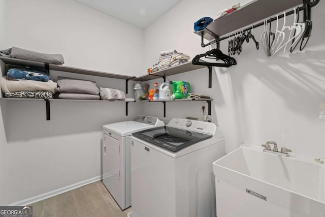 438 Southland Cir, Canton, GA 30115 - washroom featuring separate washer and dryer and light wood-style flooring