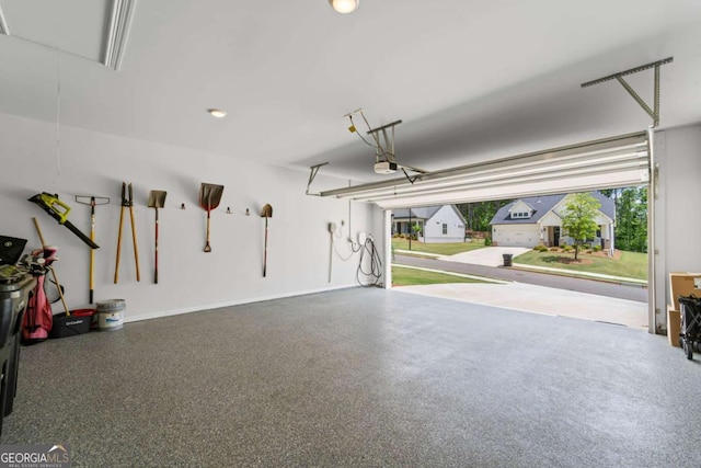 438 Southland Cir, Canton, GA 30115 - garage with a garage door opener and recessed lighting