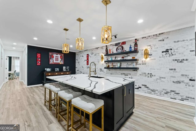 438 Southland Cir, Canton, GA 30115 - kitchen featuring a sink, baseboards, ornamental molding, recessed lighting, and light wood-style flooring