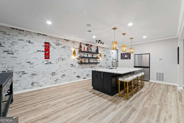 438 Southland Cir, Canton, GA 30115 - kitchen featuring freestanding refrigerator, baseboards, ornamental molding, recessed lighting, and dark cabinetry