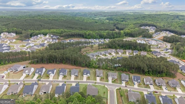 438 Southland Cir, Canton, GA 30115 - aerial view of property and surrounding area with a heavily wooded area and nearby suburban area