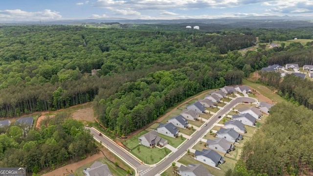 438 Southland Cir, Canton, GA 30115 - aerial view of property's location with a forest and nearby suburban area