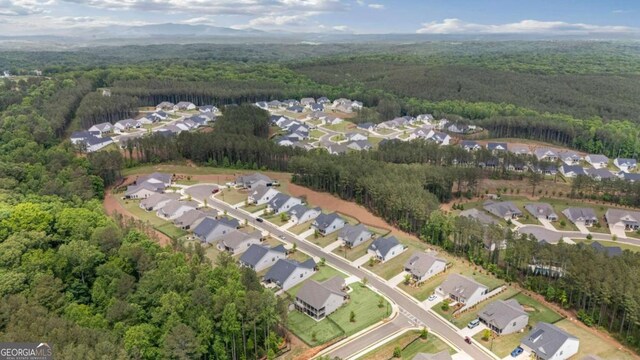438 Southland Cir, Canton, GA 30115 - aerial view of property's location featuring a heavily wooded area and nearby suburban area