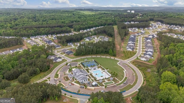 438 Southland Cir, Canton, GA 30115 - aerial view of property and surrounding area featuring a heavily wooded area and a pool area