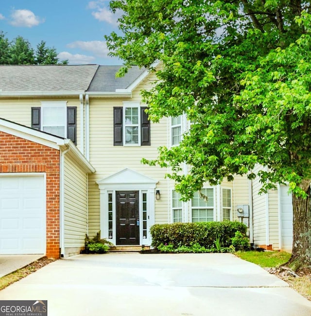 5138 Timber Hills Way, Oakwood, GA 30566 - townhome / multi-family property with concrete driveway and roof with shingles