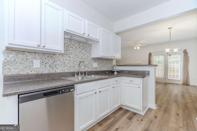 5138 Timber Hills Way, Oakwood, GA 30566 - kitchen featuring stainless steel dishwasher, a sink, white cabinetry, and backsplash