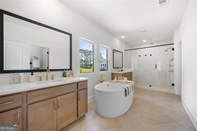 17145 River Overlook Dr, Roswell, GA 30075 - full bathroom featuring a shower stall, vanity, a freestanding tub, tile patterned flooring, and recessed lighting