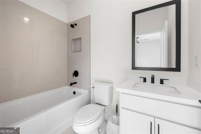 full bath featuring toilet, vanity, and bathing tub / shower combination