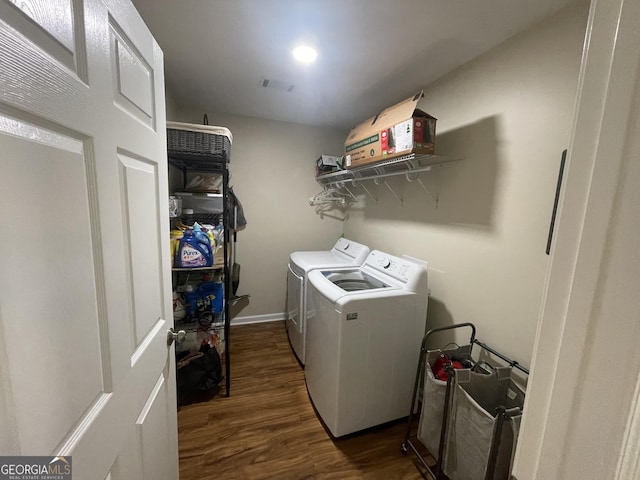 659 Voyles Rd, Carnesville, GA 30521 - laundry room with washer and clothes dryer and dark wood-style floors