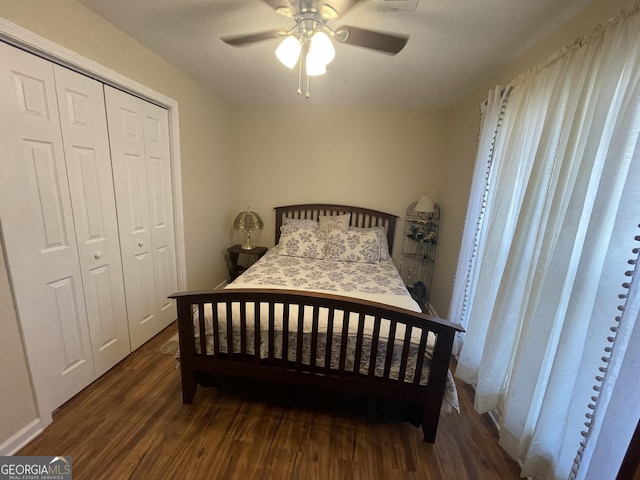 659 Voyles Rd, Carnesville, GA 30521 - bedroom featuring wood finished floors, a closet, ceiling fan, and baseboards
