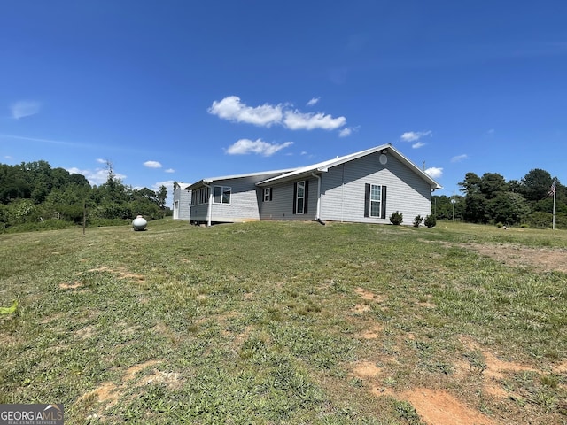 659 Voyles Rd, Carnesville, GA 30521 - view of front facade with a front lawn