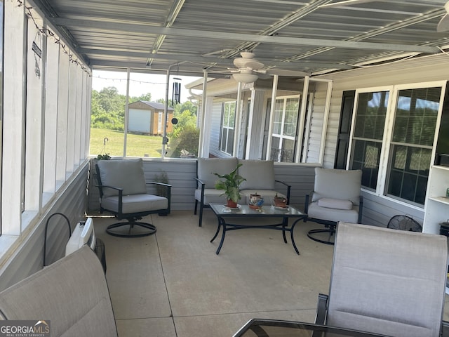 659 Voyles Rd, Carnesville, GA 30521 - sunroom with outdoor lounge area, healthy amount of natural light, and ceiling fan