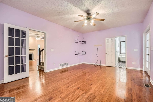 510 Aiken Dr, Dallas, GA 30157 - unfurnished bedroom featuring wood finished floors, a textured ceiling, and baseboards