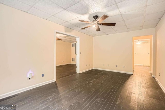 510 Aiken Dr, Dallas, GA 30157 - spare room featuring a ceiling fan, wood-type flooring, a paneled ceiling, and baseboards