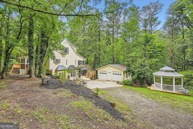 510 Aiken Dr, Dallas, GA 30157 - view of front of home featuring an outbuilding, a gazebo, a garage, and a wooded view
