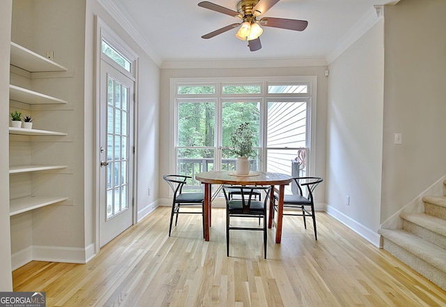 112 Windalier Rdg, Peachtree City, GA 30269 - dining space with ornamental molding, light wood-type flooring, stairway, baseboards, and a ceiling fan