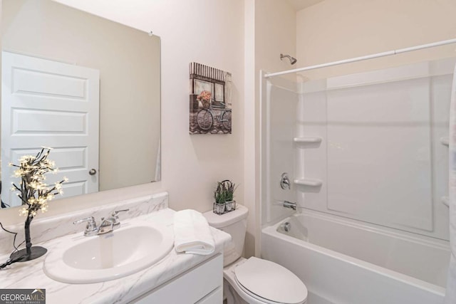 bathroom with vanity, toilet, and shower / bath combination