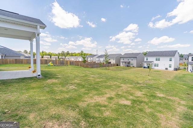 view of yard featuring a residential view