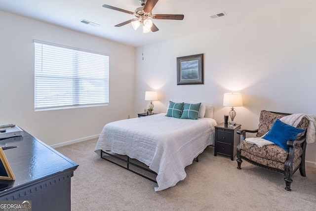 bedroom with carpet floors, baseboards, and a ceiling fan