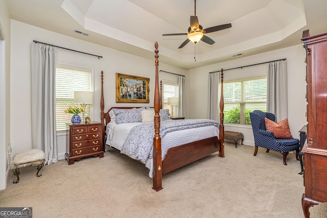 32 Meadow View Gln, Newnan, GA 30265 - bedroom with a raised ceiling, light colored carpet, ceiling fan, and baseboards
