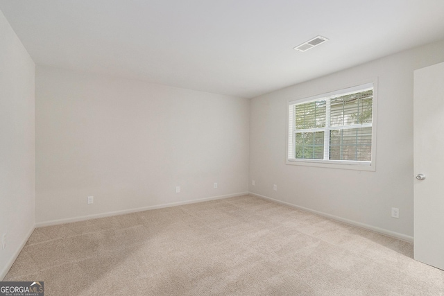 6900 Roswell Rd Unit F6, Atlanta, GA 30328 - unfurnished room featuring light carpet and baseboards