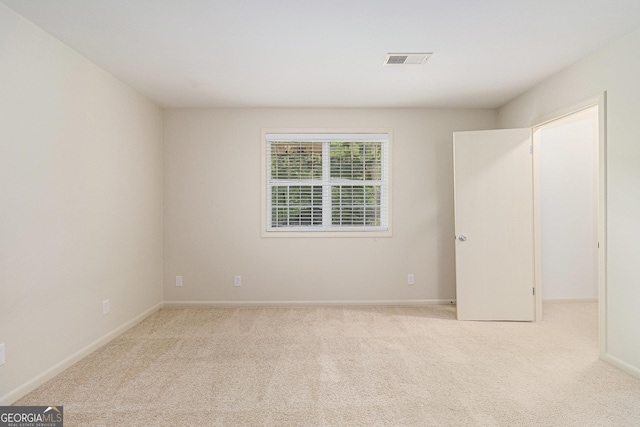 6900 Roswell Rd Unit F6, Atlanta, GA 30328 - unfurnished bedroom featuring carpet floors and baseboards
