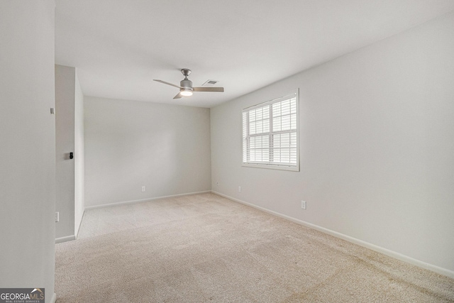 6900 Roswell Rd Unit F6, Atlanta, GA 30328 - empty room with light colored carpet, ceiling fan, and baseboards