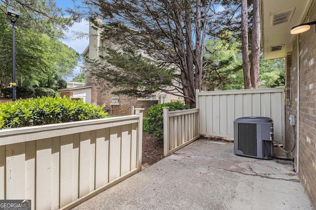 6900 Roswell Rd Unit F6, Atlanta, GA 30328 - view of patio / terrace with central AC unit