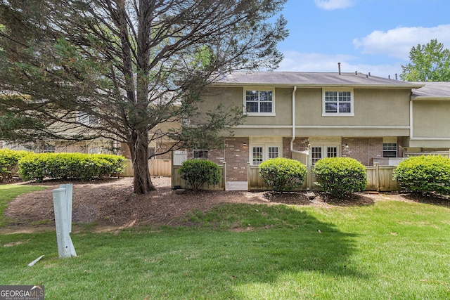 6900 Roswell Rd Unit F6, Atlanta, GA 30328 - view of front of home featuring stucco siding and brick siding