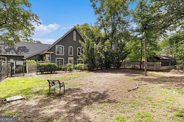 6900 Roswell Rd Unit F6, Atlanta, GA 30328 - rear view of house with stucco siding