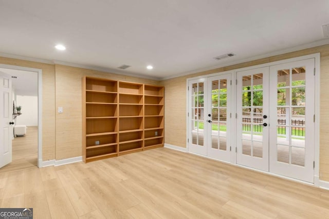 unfurnished room featuring french doors, baseboards, wood finished floors, crown molding, and recessed lighting