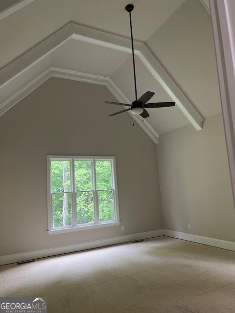 5907 SW Bunting Ln SW Unit 2, Atlanta, GA 30331 - carpeted empty room with vaulted ceiling, baseboards, and a ceiling fan