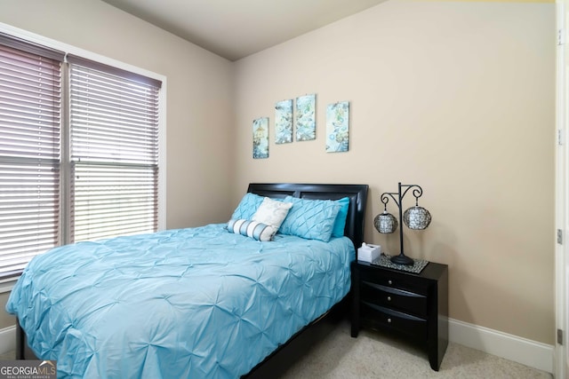 663 Warm Springs Ct, Loganville, GA 30052 - carpeted bedroom with baseboards