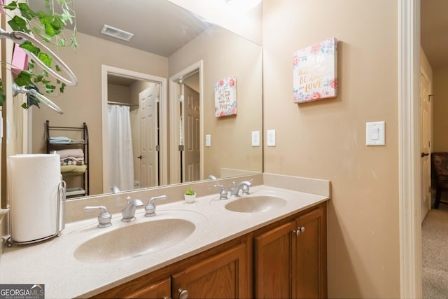 663 Warm Springs Ct, Loganville, GA 30052 - full bathroom featuring double vanity