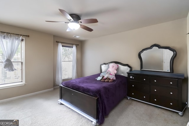 663 Warm Springs Ct, Loganville, GA 30052 - bedroom featuring light carpet and a ceiling fan