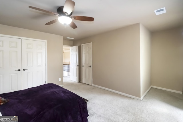 663 Warm Springs Ct, Loganville, GA 30052 - carpeted bedroom featuring a ceiling fan and a closet