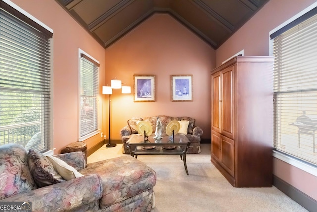 663 Warm Springs Ct, Loganville, GA 30052 - carpeted living room featuring plenty of natural light and vaulted ceiling