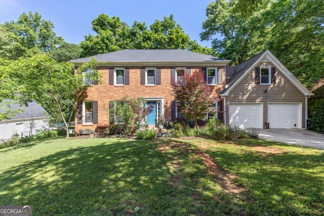 colonial-style house with a front yard, driveway, and brick siding