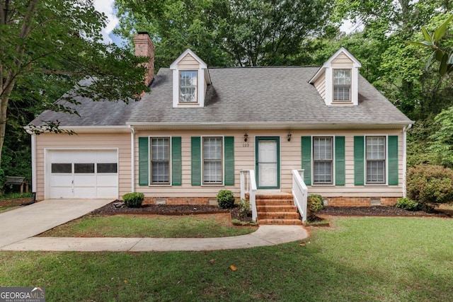 new england style home featuring crawl space, an attached garage, and a shingled roof