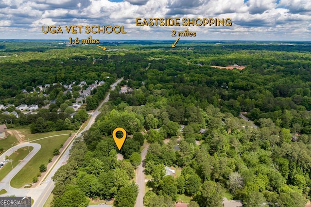 drone / aerial view of a heavily wooded area