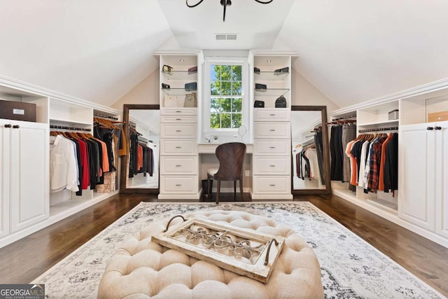 3456 Glen Mist Pl, Dacula, GA 30019 - walk in closet with lofted ceiling and dark wood-style floors