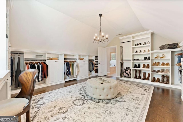 3456 Glen Mist Pl, Dacula, GA 30019 - sitting room with vaulted ceiling, a chandelier, and dark wood-style floors