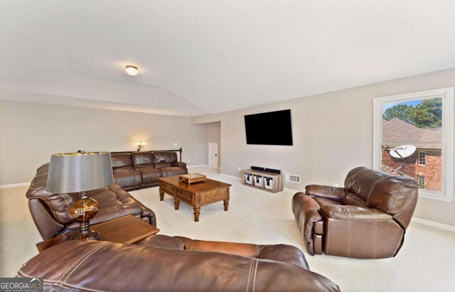 3456 Glen Mist Pl, Dacula, GA 30019 - living room featuring carpet, vaulted ceiling, and baseboards