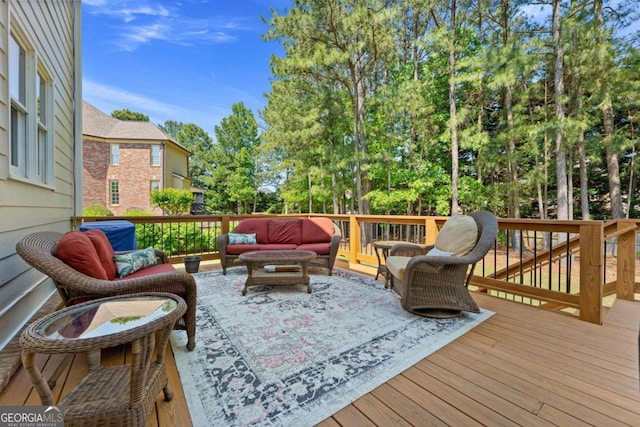 3456 Glen Mist Pl, Dacula, GA 30019 - wooden deck featuring outdoor lounge area and view of scattered trees